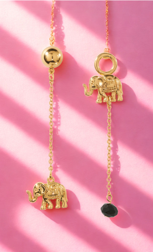 Aretes TISSINI listo para vender junto a ropa y fajas colombianas